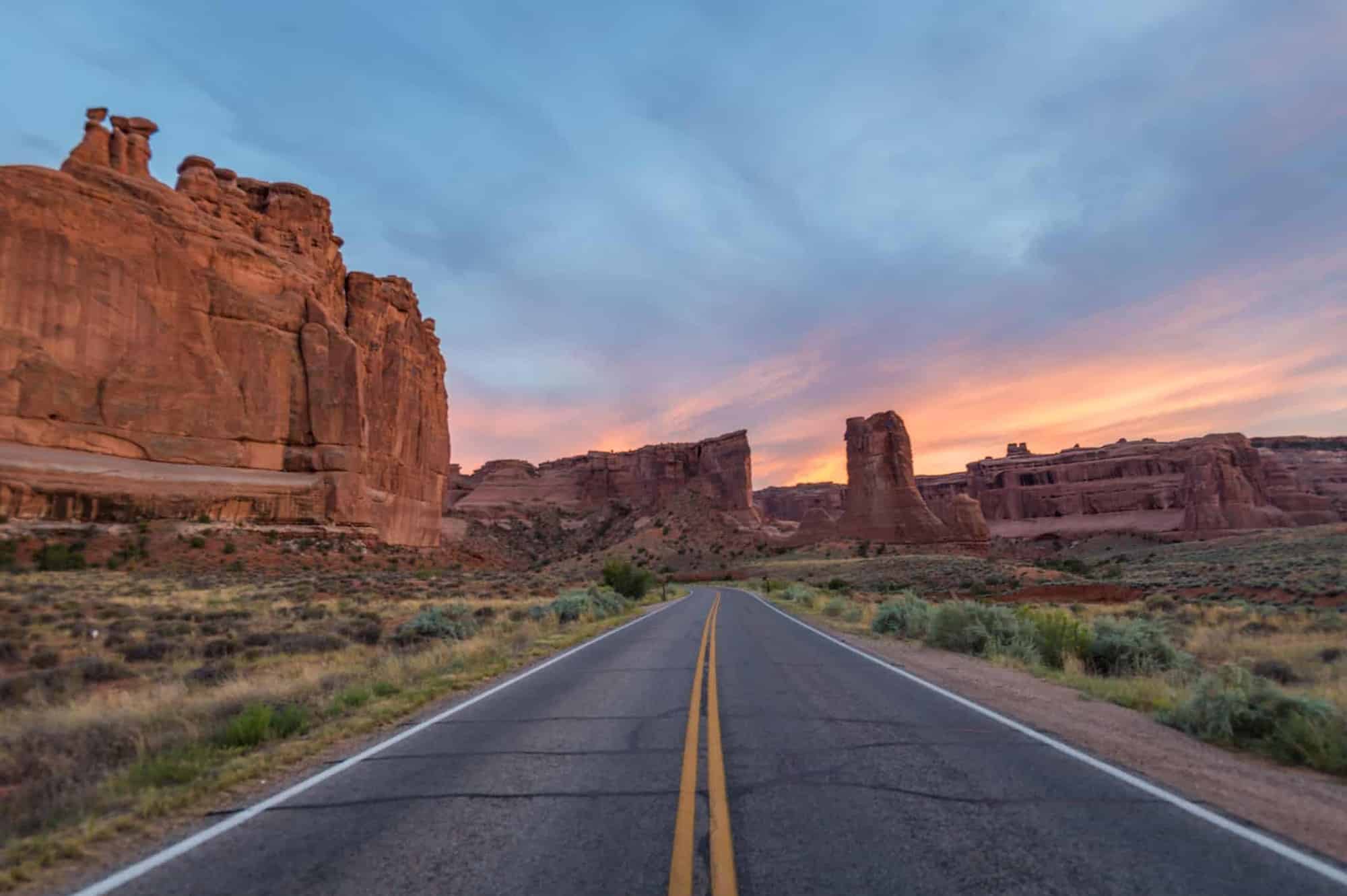 Beginning of the Arches Scenic Drive climbing into red rock formations