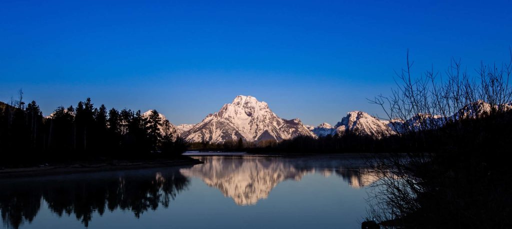 Oxbow Bend on the Snake River with Mount <a href=https://yournpguide.com/nearby-towns/moran/ class=npd-auto-link title=