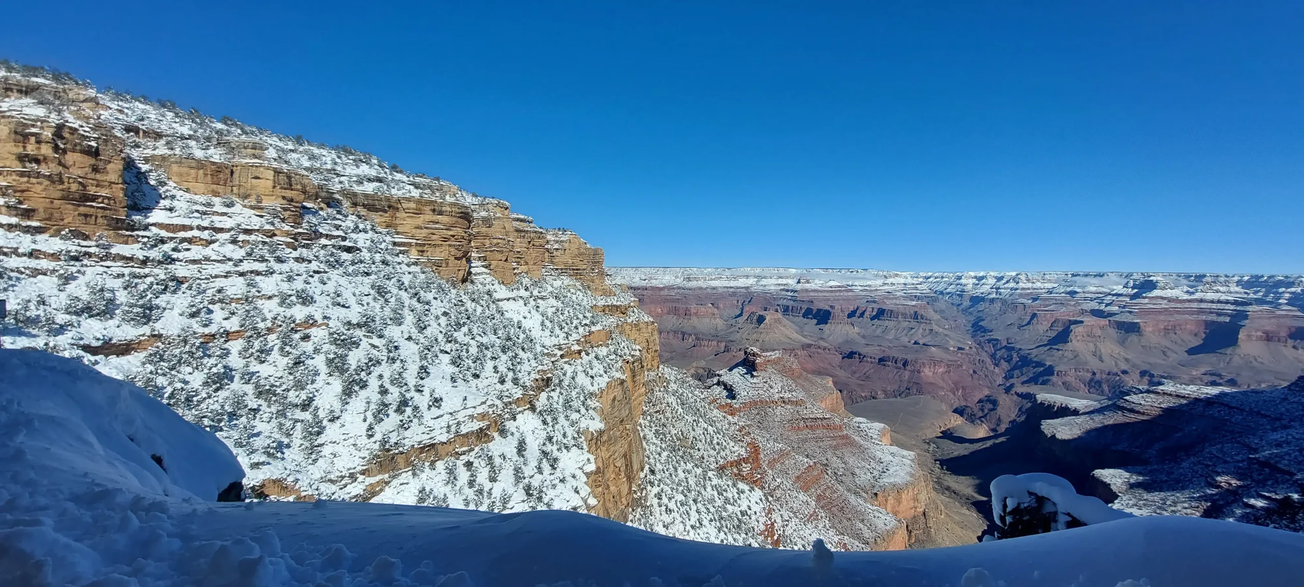 Hikers on the Bright Angel Trail descending into Grand Canyon National Park from the South Rim trailhead