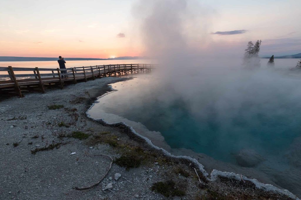 Steamy morning sunrise at West Thumb Geyser Basin in Yellowstone National Park
