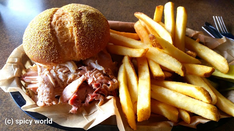 Pulled pork sandwich with fries served at Yellowstone National Park.