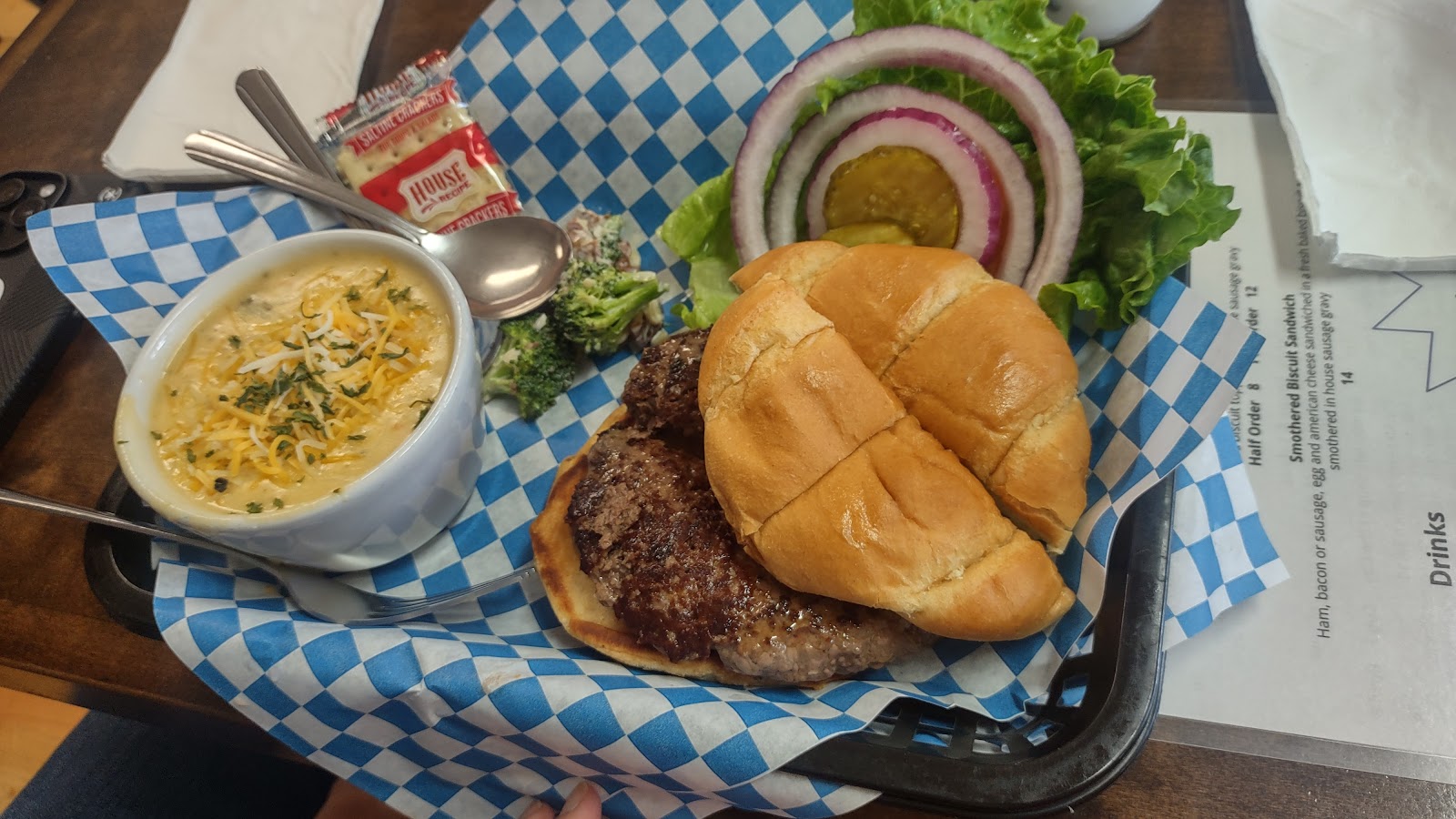 Hamburger with onions, lettuce, and cheese served at Glacier National Park eatery