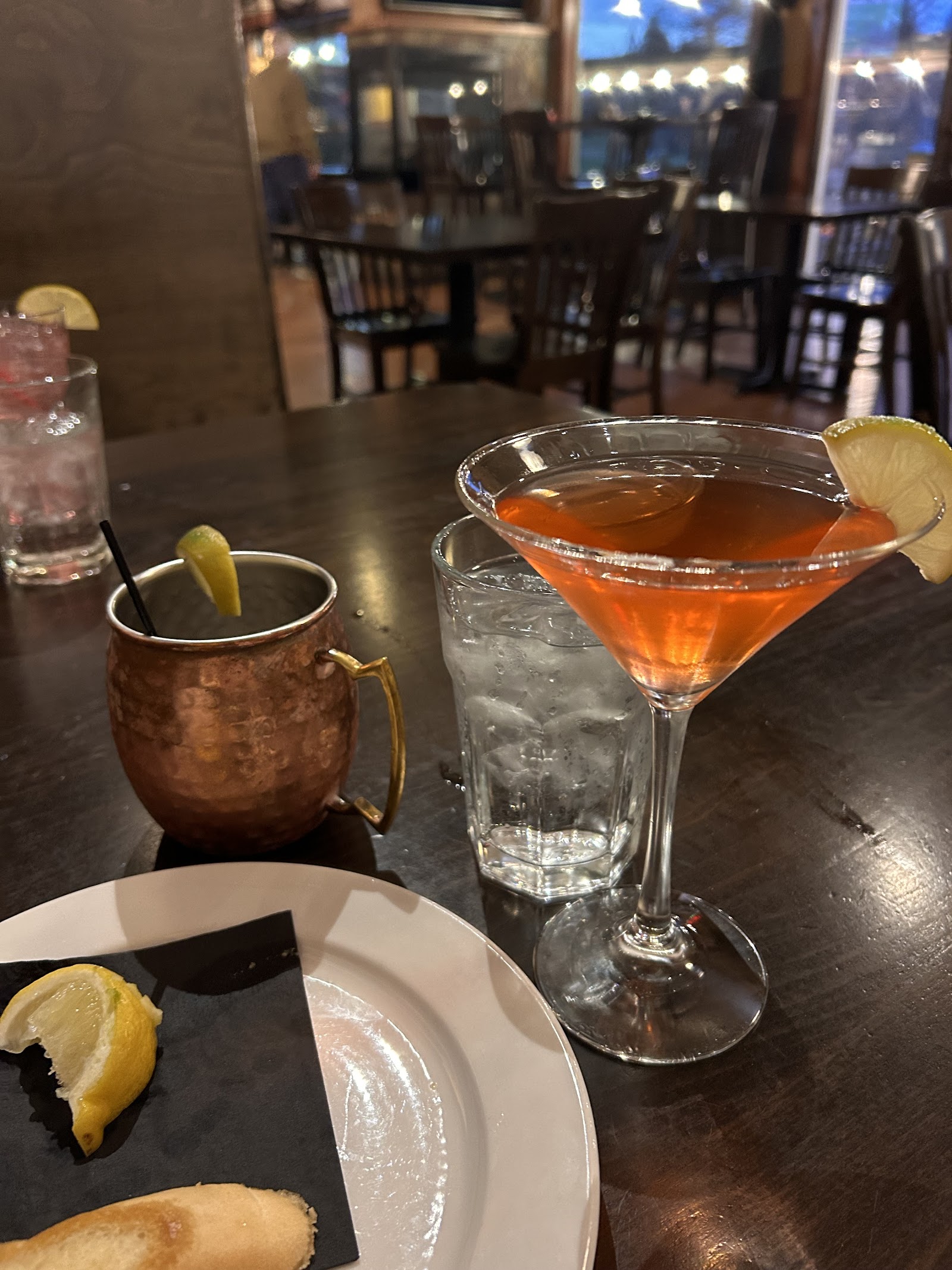 Interior bar area at Glacier National Park near Meadow Lake, with a cocktail on the table.