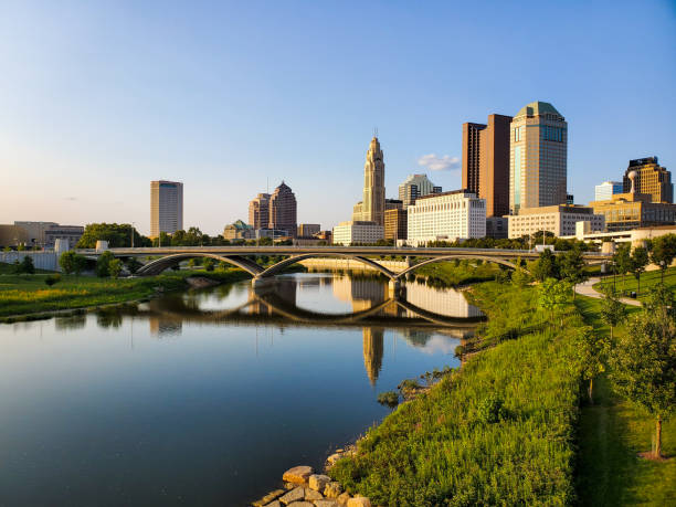 Parke Peak overlook in Glacier National Park offering river and bridge reflections with the downtown skyline in view.