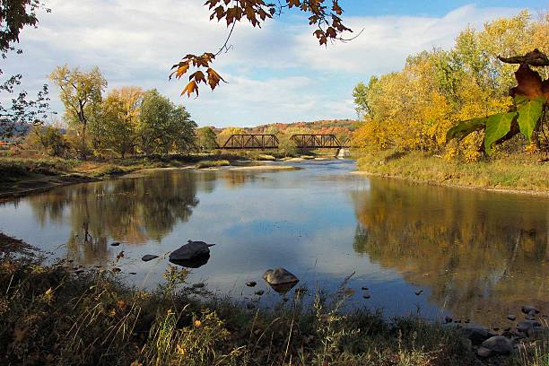 Parke Peak overlook along the river in Glacier National Park during autumn.