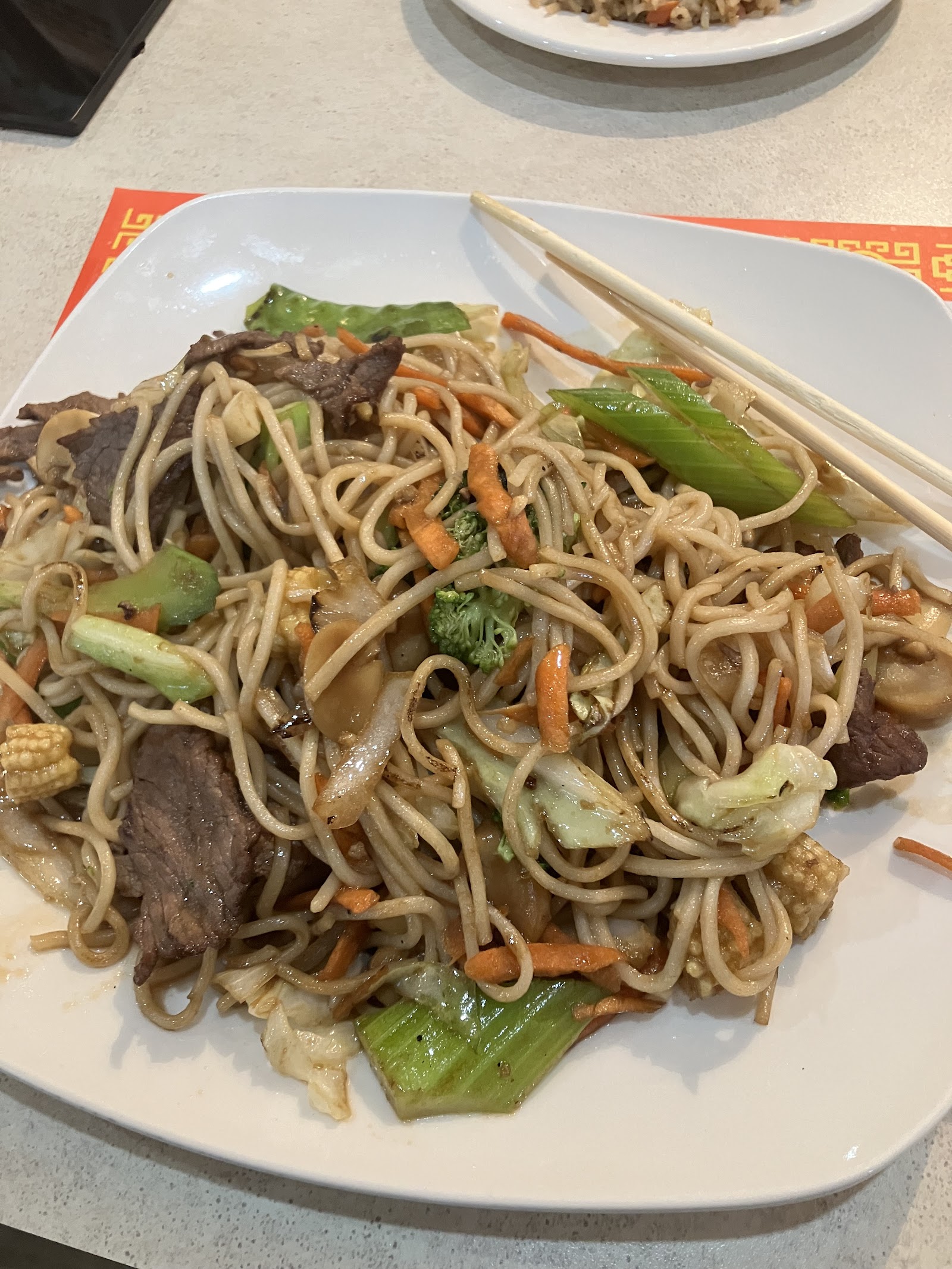 Beef chow mein with vegetables served at a Glacier National Park dining spot.