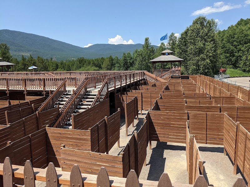Wooden maze walkways and a viewing pavilion at Glacier National Park, a recreational center setting.