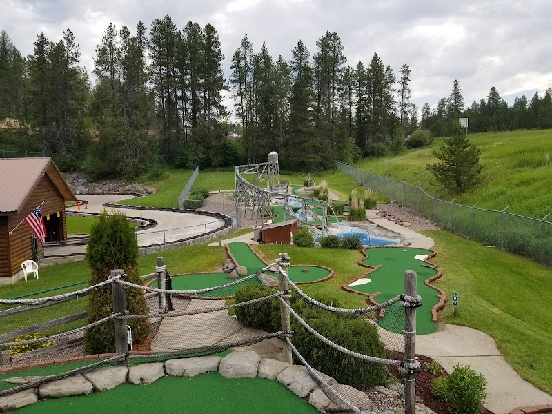Mini golf course with rope obstacle and water features at a family recreation center near Glacier National Park.