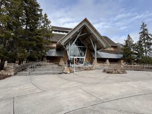 Exterior view of the Visitor Center building with an inviting entrance and informational signs