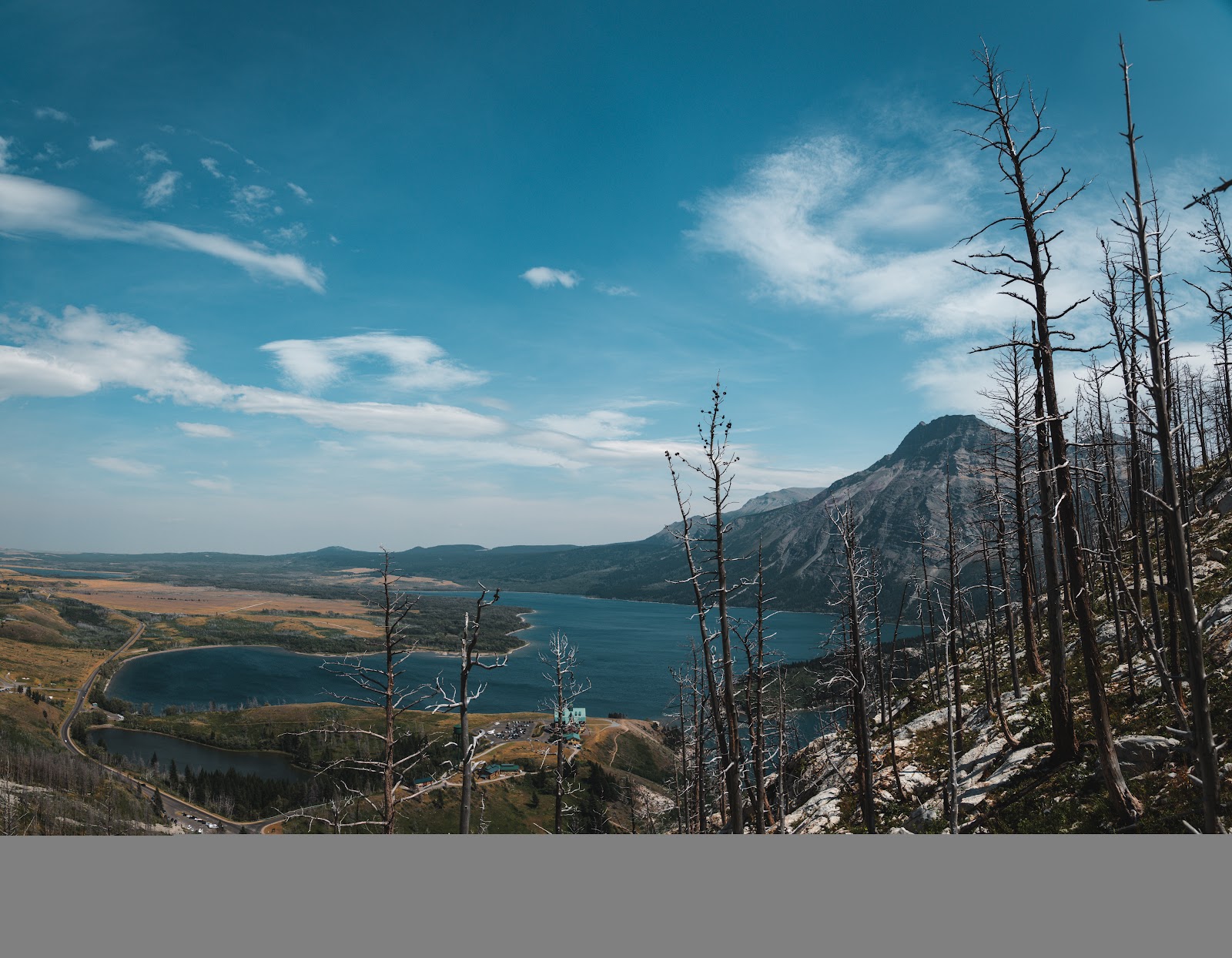 Bear's Hump Trailhead overlook in Glacier National Park offers sweeping valley views.