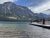 Saint Mary Lake at Glacier National Park, a tranquil lakefront with a wooden dock against rugged peaks.