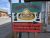 A colorful roadside sign with a large sombrero illustration advertising real Mexican food and fresh tortillas near Yellowstone.
