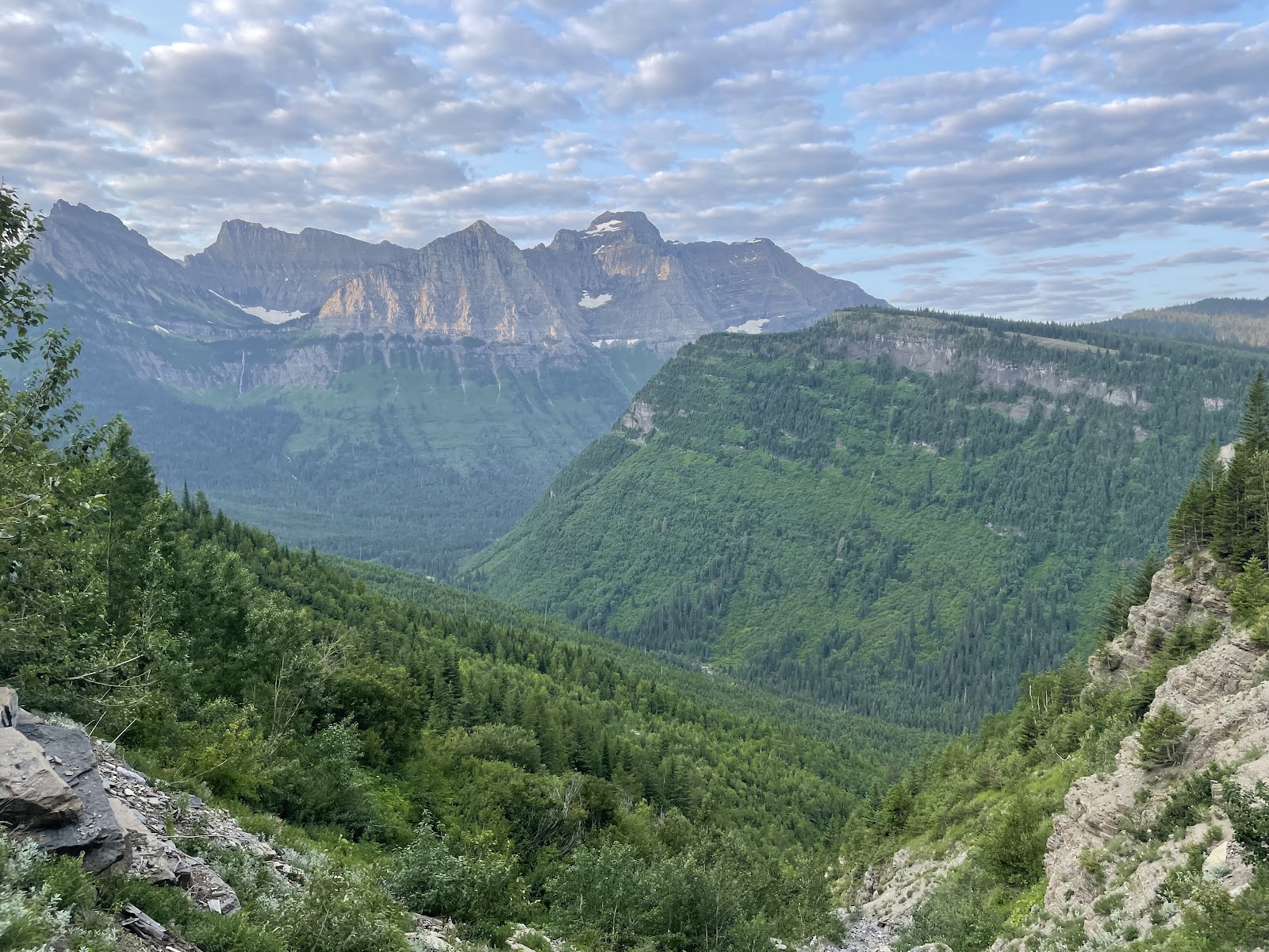 Going-to-the-Sun Mountain towers above Glacier National Park, with sweeping alpine valleys and towering peaks.