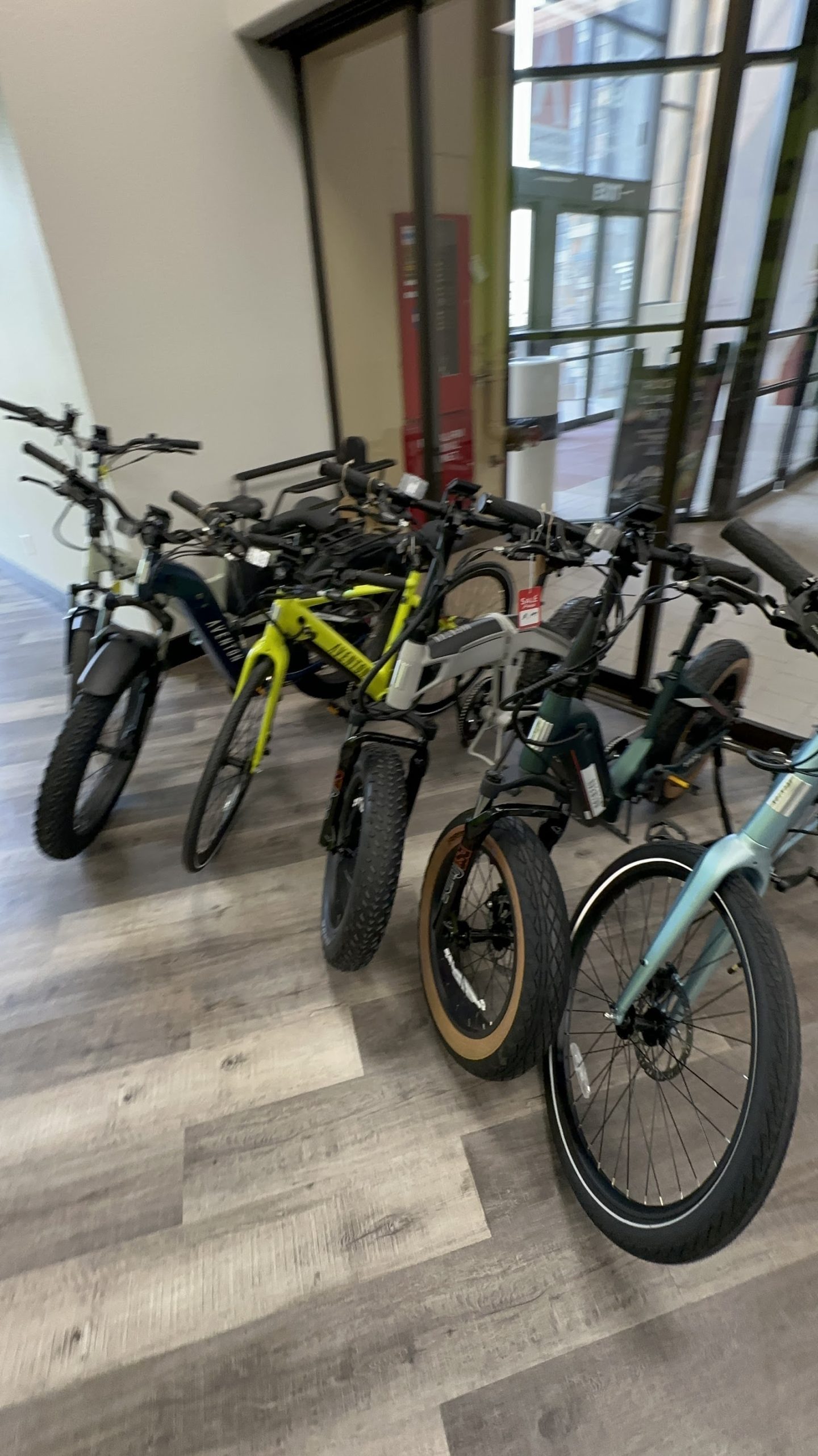 Interior of Glacier National Park gift shop with several electric bikes on display.
