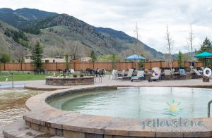 Rustic exterior of a hot springs facility with wooden accents