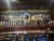 Rustic pub interior with numerous beer taps and a colorful stained-glass centerpiece, Yellowstone National Park
