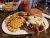 Cheeseburger with melted cheese and fries served at Old Town Cafe in Yellowstone National Park.