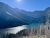 Bertha Trailhead overlook along a glacial valley and bright alpine lake in Glacier National Park