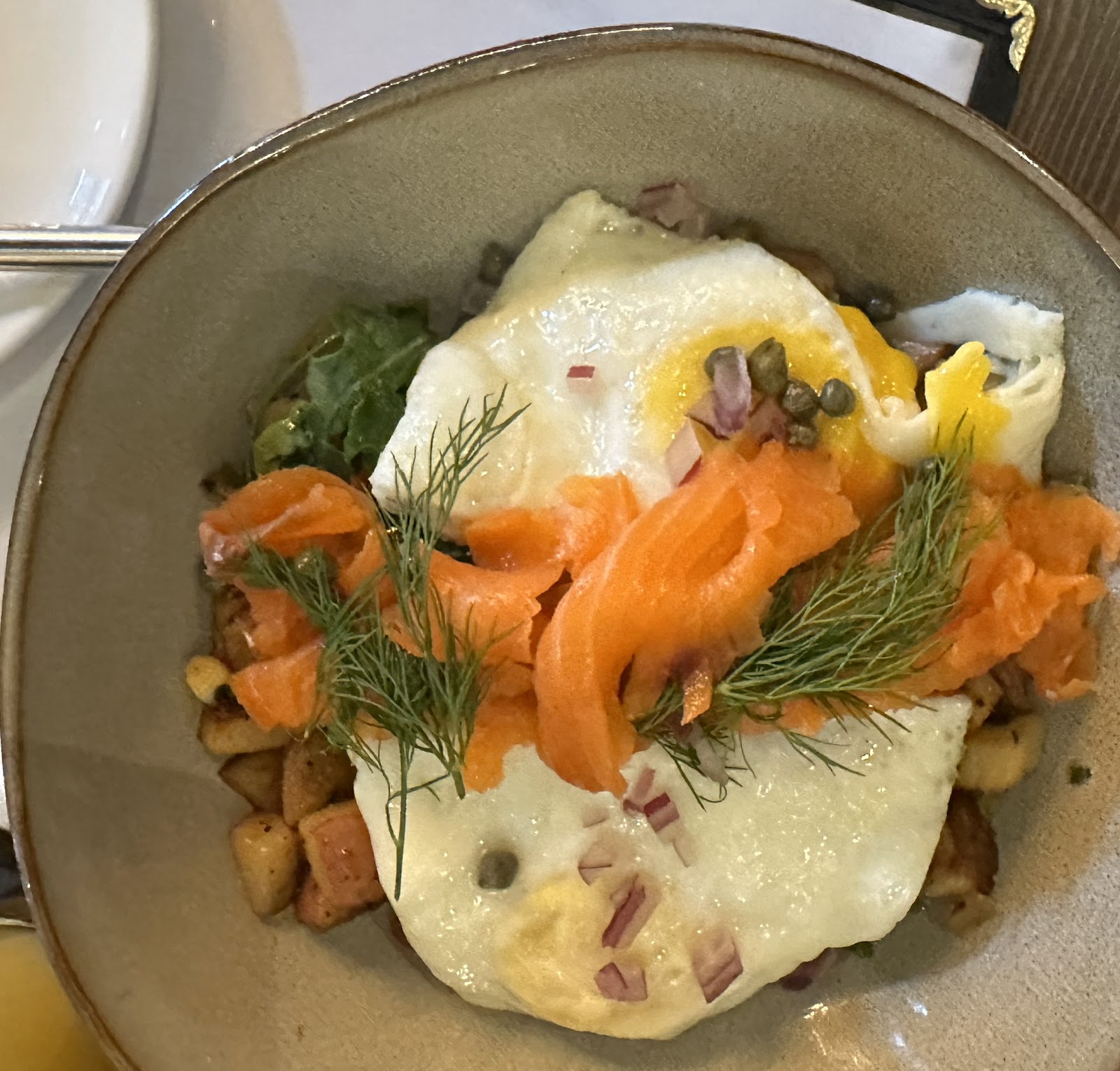 Smoked salmon with dill and eggs plated in Grouse Mountain Lodge dining room, Glacier National Park.