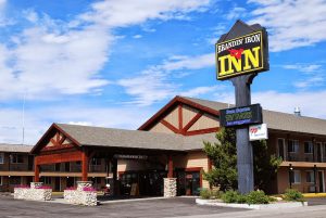 Rustic facade and covered porch of a cozy lodging