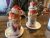 Two oversized whipped-cream topped milkshakes with strawberry drizzle and crunchy toppings at a Glacier National Park cafe.