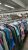 Brightly colored shirts and jackets line racks inside Whitefish Thrift in Glacier National Park.