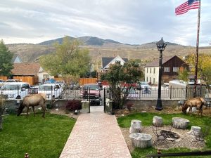 Exterior facade of a rustic lodging property with timber accents and a welcoming entrance