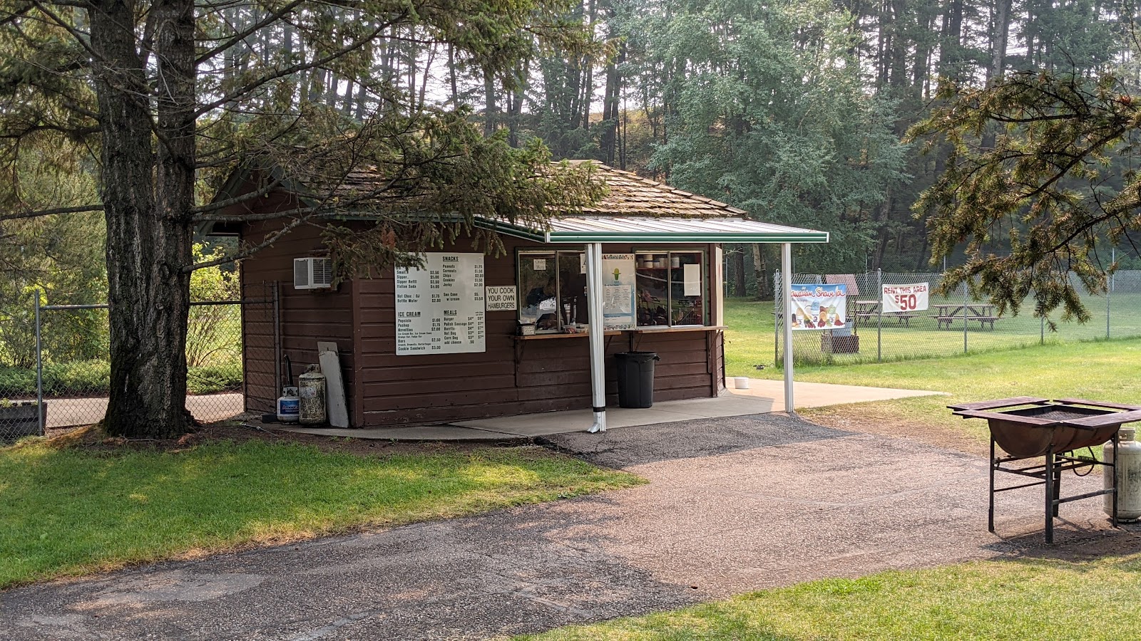 Concession stand at Glacier National Park near Big Sky Waterpark, selling snacks and beverages to visitors.