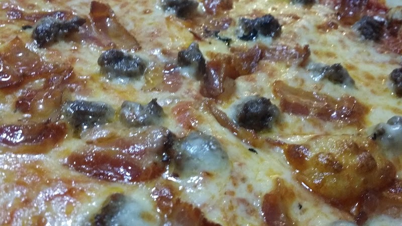 Pepperoni cheese pizza close-up at a casual eatery near Acadia National Park.