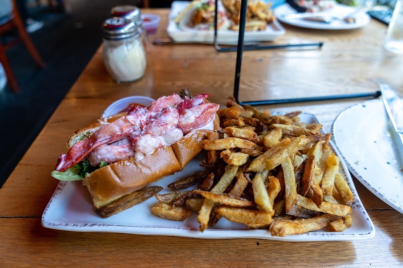 Interior dining room with wood tables and warm ambient lighting