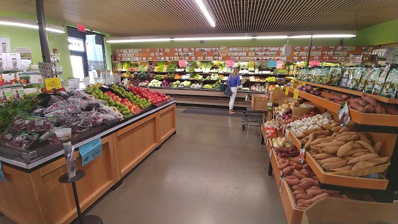 Inside a grocery store near Glacier National Park with colorful fruit and vegetable display in Columbia Falls, Montana