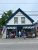 Deer Isle Café storefront on Mount Desert Island with striped awnings in Acadia National Park.