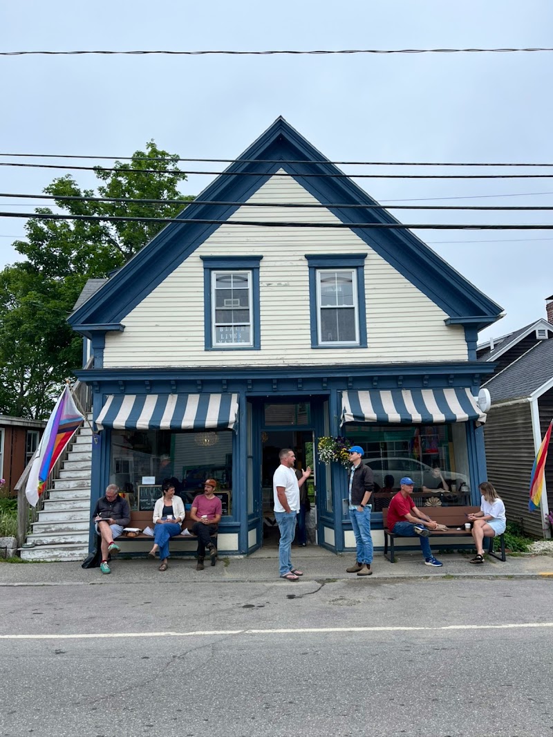 Deer Isle Café storefront on Mount Desert Island with striped awnings in Acadia National Park.