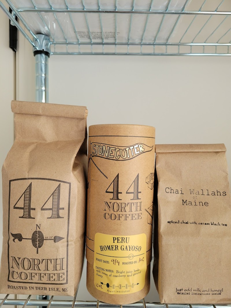 Coffee bags on display inside Deer Isle Café in Acadia National Park, showcasing local roasts.