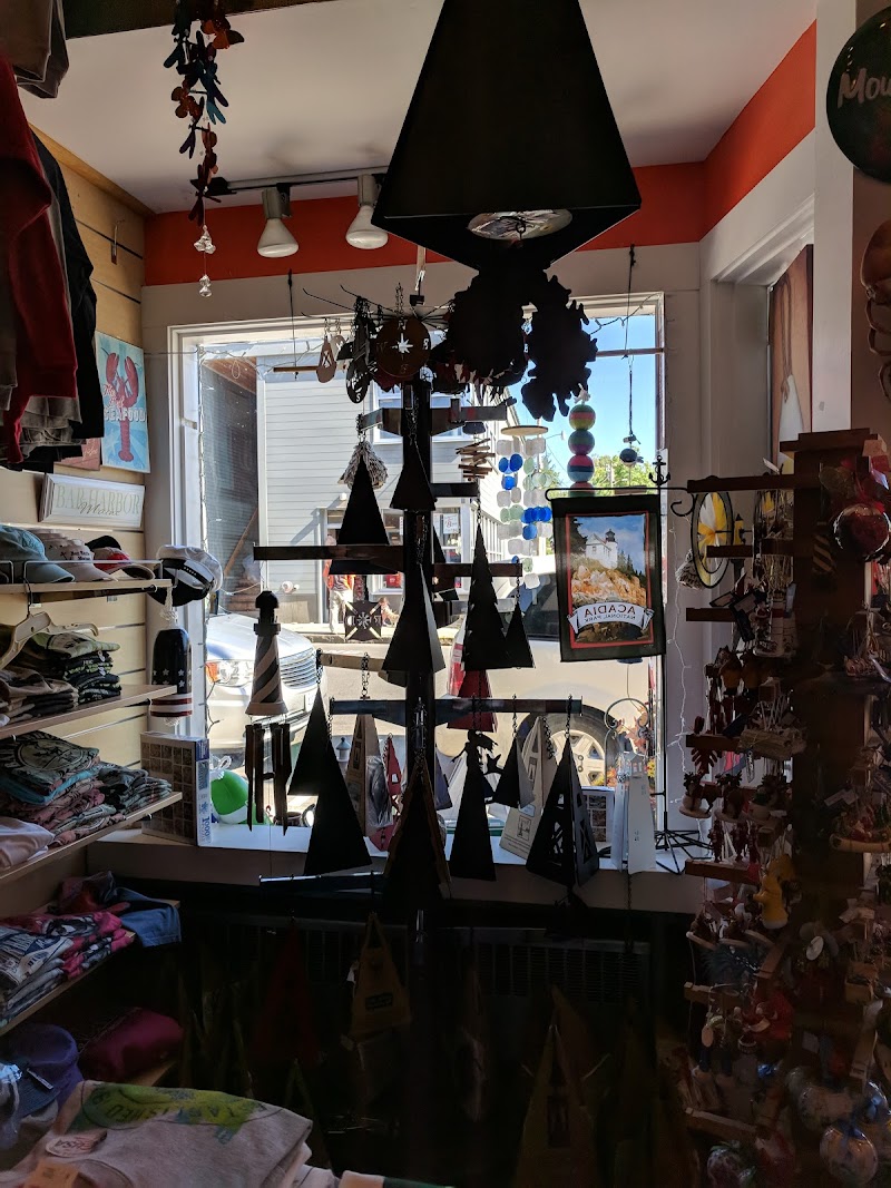 Cozy gift shop interior in Acadia National Park, with hanging decorations, souvenirs, and colorful displays.