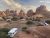 RVs parked along a curved road with towering red rock spires at Devils Garden Campground, Arches National Park.