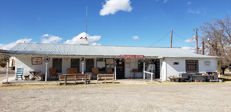 Ranch storefront and outdoor seating along a dusty road in Big Bend National Park.