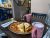 A Yellowstone National Park cafe breakfast plate with toast, eggs, and home fries, served at a casual inside dining area.
