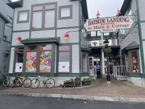 Bayside Landing entrance at Main & Cottage Streets, a harbor-side storefront cluster in Acadia National Park.