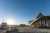 Glamping tents and a modern lodge at a Yellowstone National Park lodging site near West Yellowstone at sunrise.