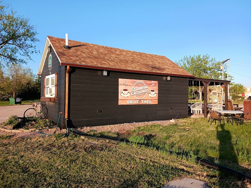 Barista pouring latte art into a cup during service