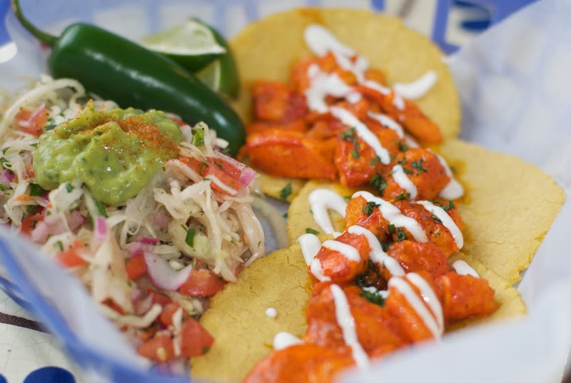 Tacos with salsa and a cabbage-tomato slaw served at a Mexican-style eatery in Acadia National Park.