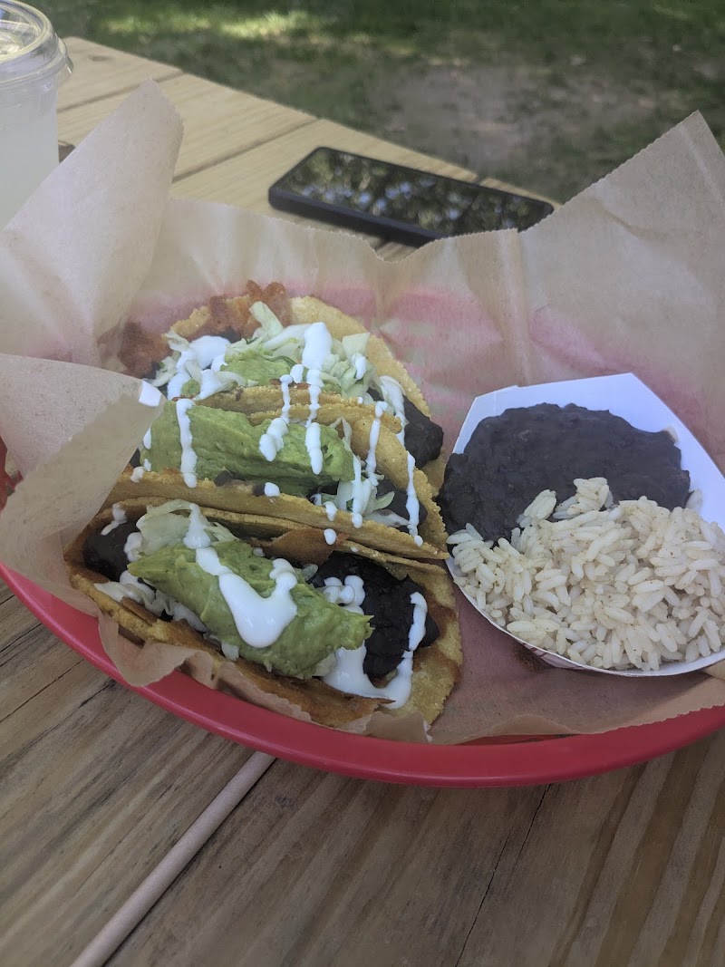 Taco platter with guacamole, rice, and beans at El El Frijoles Mexican Food in Acadia National Park.