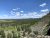 Fairy Falls overlook along the Fairy Falls Trail in Yellowstone National Park, with a forested valley below.