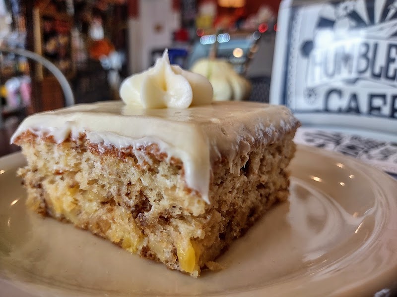 Slice of yellow cake with white frosting served at an Acadia National Park cafe.