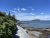 Bar Harbor Shore Path winds along the rocky shoreline with greenery in Acadia National Park.