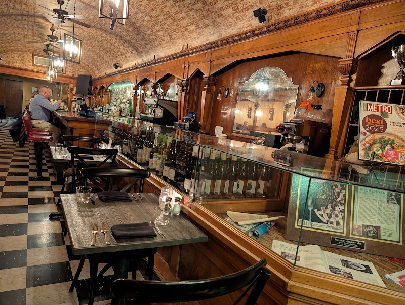 Interior view of a classic restaurant bar along a glass display counter in Acadia National Park.