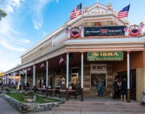 Historic hotel exterior along Yellowstone National Park's gateway corridor near Cody, Wyoming.