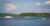 Patten Pond area at Acadia National Park, a lakeside scene with boats, a dock, and forested shoreline.