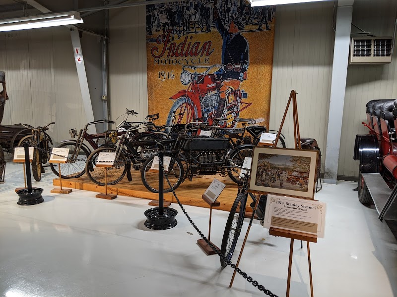 Vintage motorcycles on display inside Seal Cove Auto Museum, Acadia National Park
